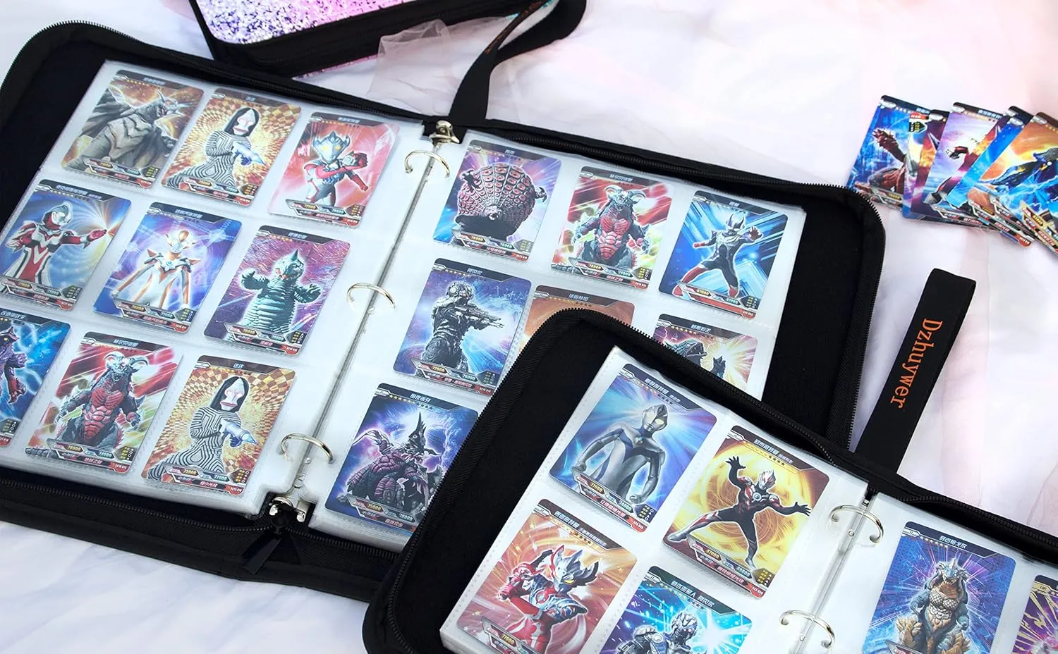 Trading Card Binder for 9-Pocket (1080 Cards) with 60 Removable Sleeves, with Protection Zipper and Easy Carrying Wristband, Portable Card Albums for Boys Girls Gifts, Pink
